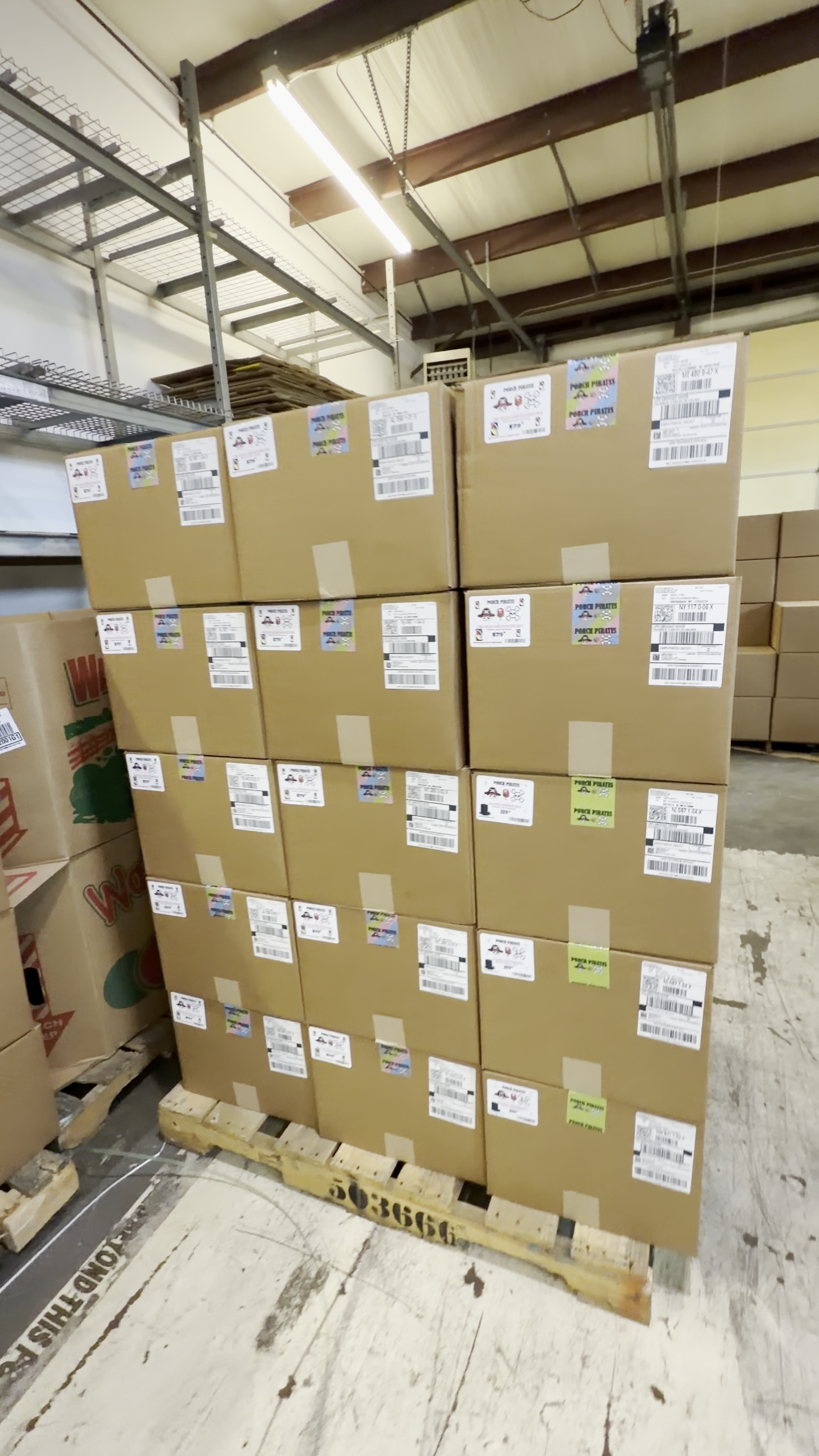 Pallets of sealed and labeled mystery boxes ready to ship